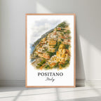 Framed Positano art in a natural Red Oak wood frame. Emphasizes the warm, terracotta and yellow tones of the village.