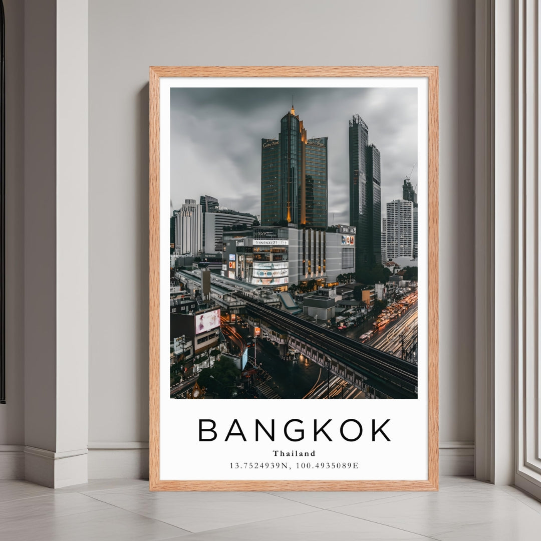 A framed urban cityscape print of Bangkok, Thailand, with a rustic red oak wood frame, perfect for home or office decor.