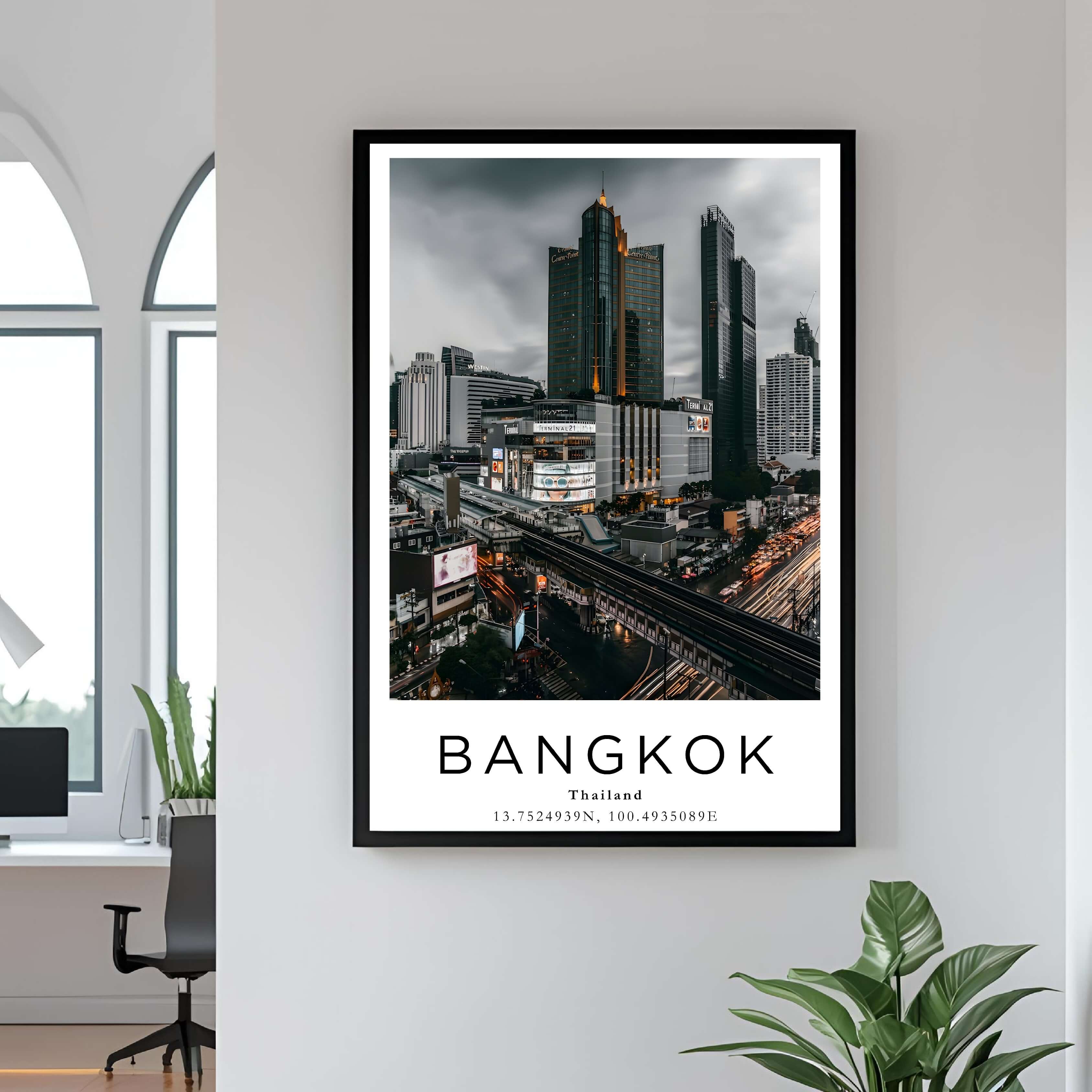  A framed wall art print of Bangkok, Thailand, featuring a sleek white frame that complements the city's modern architecture.