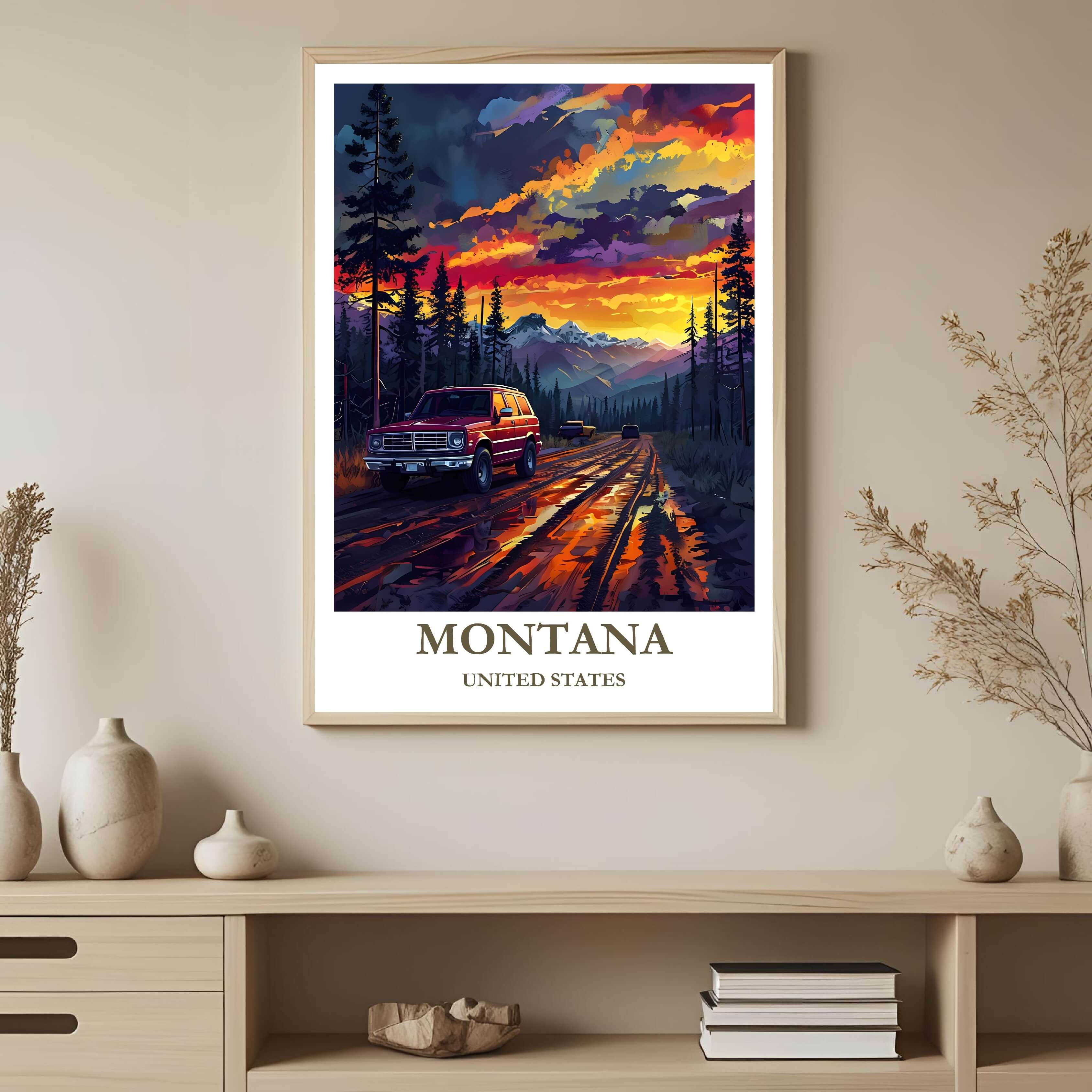 A framed art print depicting the vibrant Montana mountain landscape at sunset, styled to complement a moody and elegant interior.