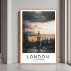A framed print of London, UK, with a rustic red oak wood frame, highlighting the historic Houses of Parliament.