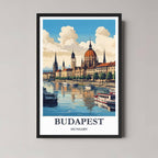 A framed, vibrant illustration of the Budapest skyline with a classic black frame, featuring the Parliament building along the Danube River.