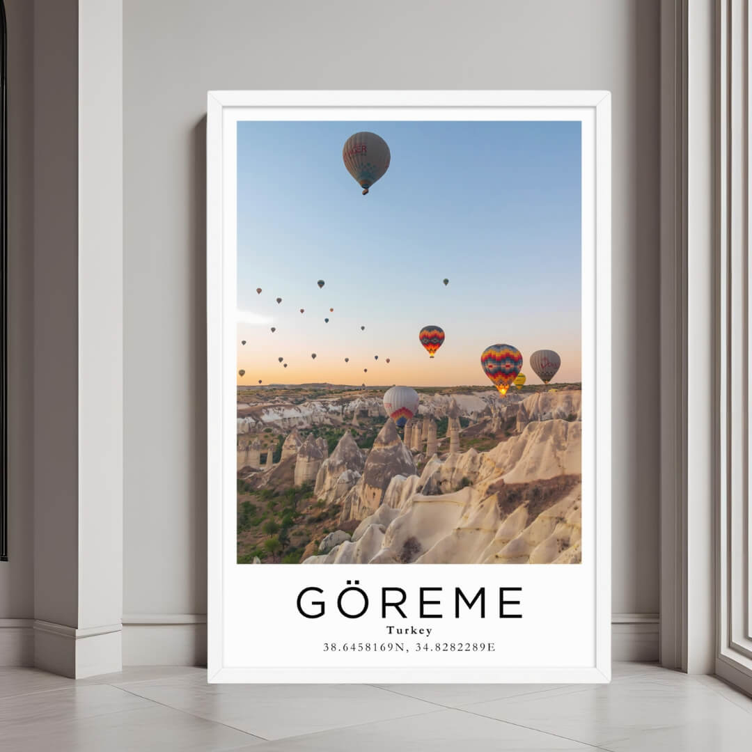 A framed art print of Cappadocia with hot air balloons, featuring a clean white frame, perfect for a minimalist decor style.