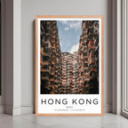A framed print of Hong Kong, China, with a rustic red oak wood frame, highlighting the unique urban landscape.