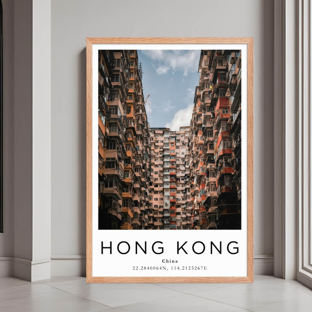 A framed print of Hong Kong, China, with a rustic red oak wood frame, highlighting the unique urban landscape.