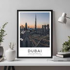 A framed travel poster of the Dubai skyline displayed on an office wall, adding an element of professional sophistication.