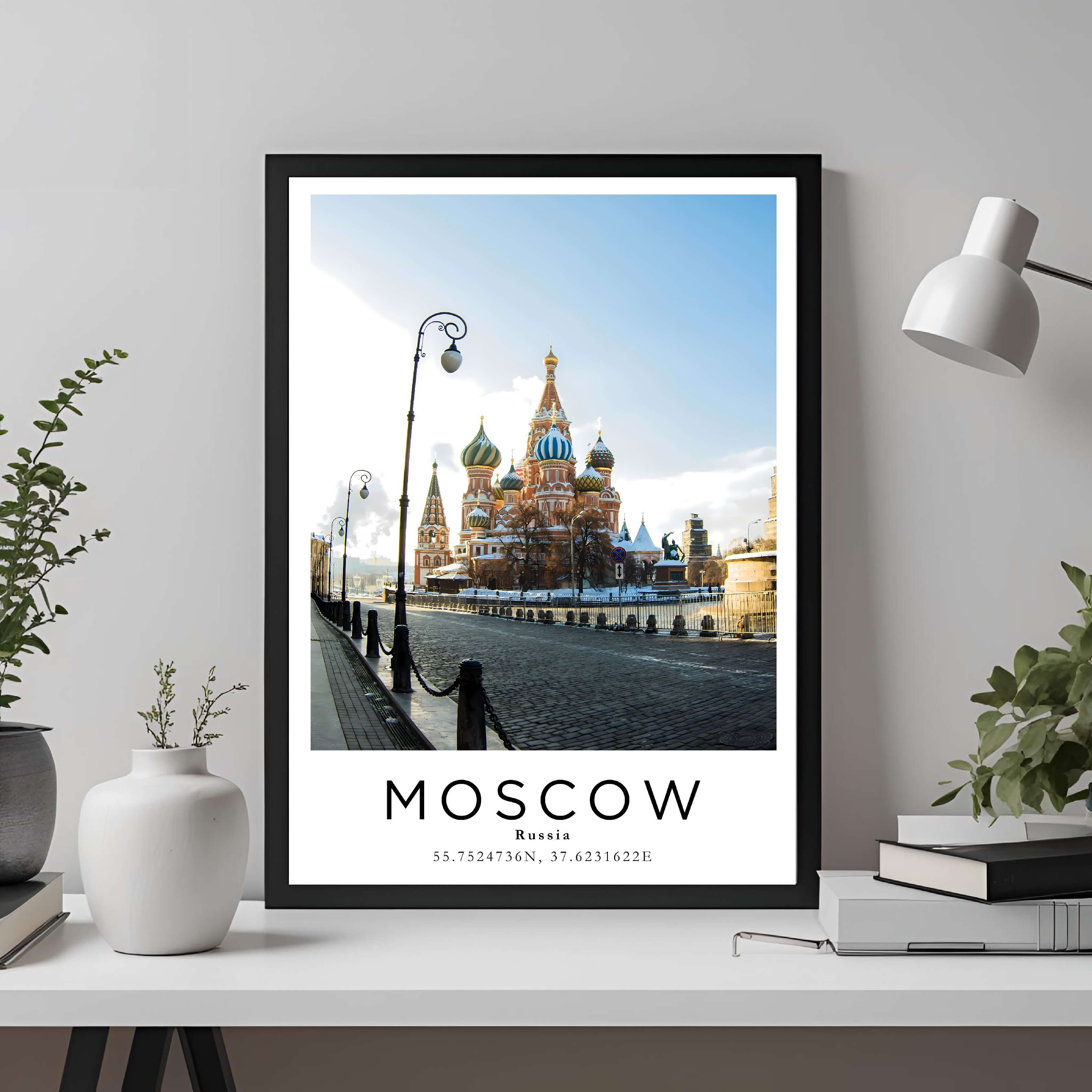  A framed travel poster of Moscow displayed on an office wall, adding an element of professional and artistic flair.