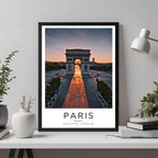 A framed travel poster of Paris displayed on an office wall, adding an element of professional and artistic flair.