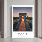 A framed wall art print of the Arc de Triomphe and surrounding square with a minimalist white frame.