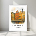 Watercolor-style print of the historic Stockholm waterfront architecture in a minimalist white frame. Captures the vibrant history of Sweden's capital.