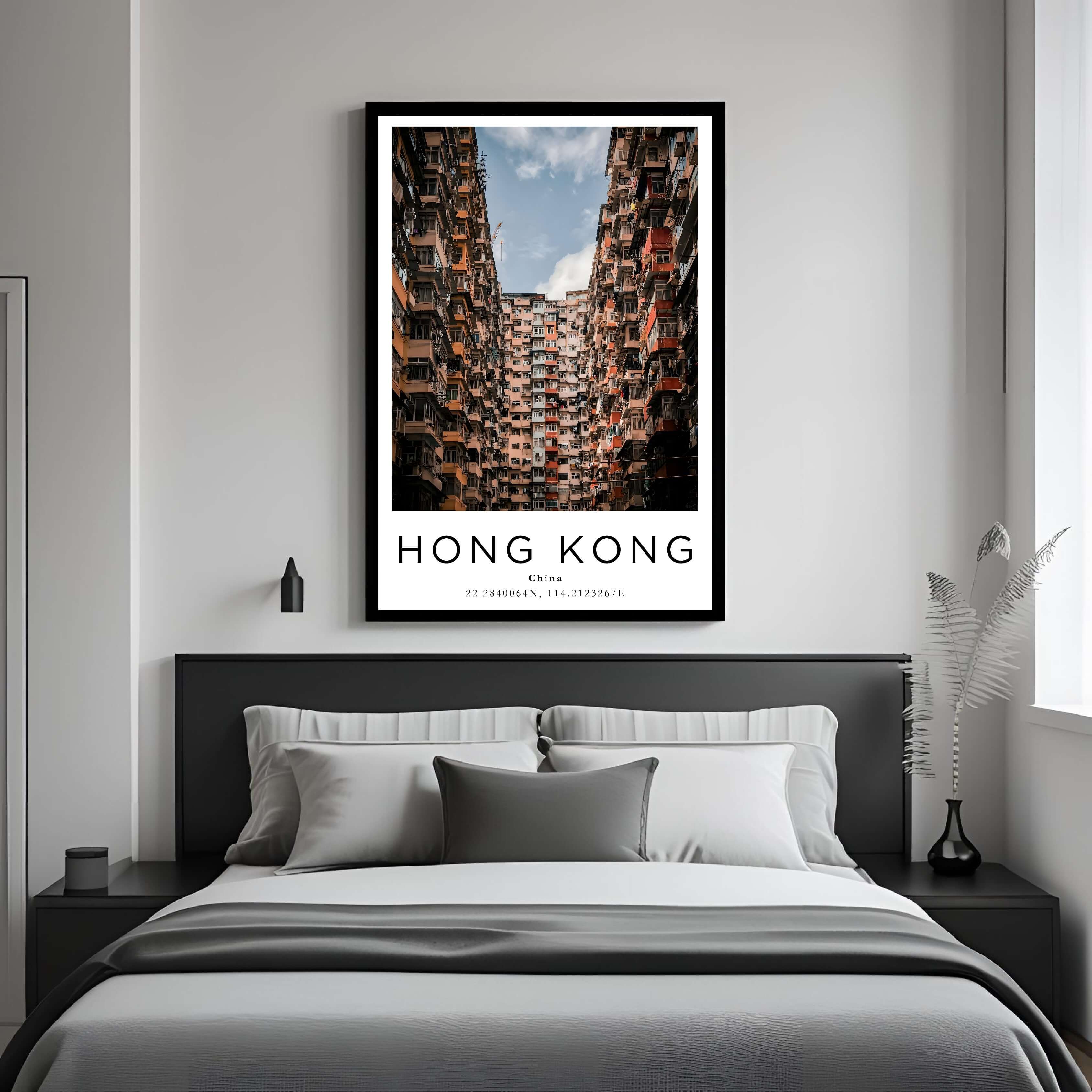 A curated art gallery wall that includes a framed Hong Kong poster, showcasing a creative and personalized collection of prints.