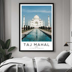 A curated art gallery wall that includes a framed Taj Mahal poster, showcasing a creative and personalized collection of prints.