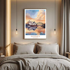 A curated art gallery wall that includes a framed Auckland poster, showcasing a creative and personalized collection of prints.