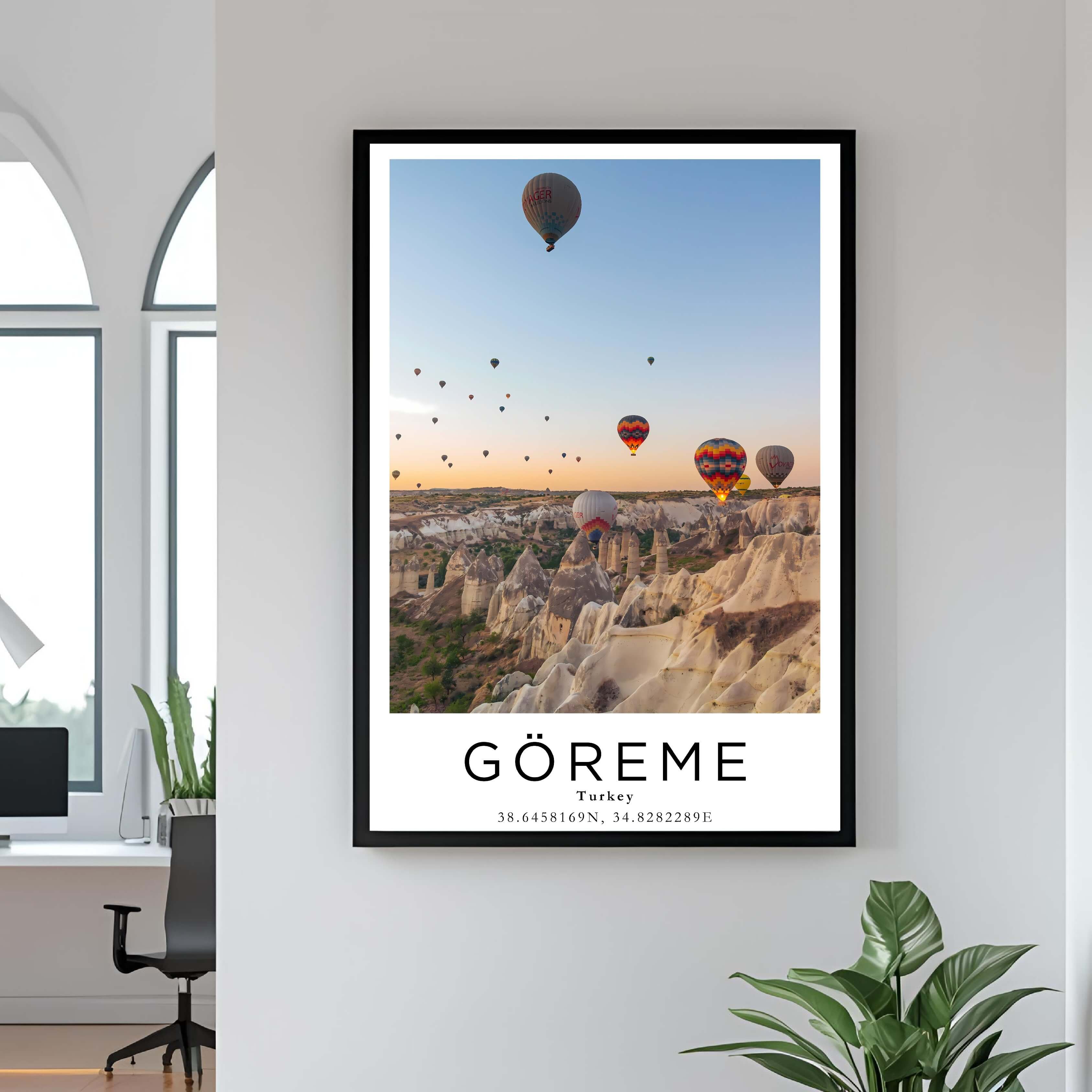 A curated art gallery wall that includes a framed Göreme poster, showcasing a creative and personalized collection of prints.