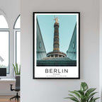 A curated art gallery wall that includes a framed Berlin poster, showcasing a creative and personalized collection of prints.