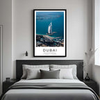 A gallery wall featuring a framed Dubai poster alongside other art prints, creating a curated and artistic display.