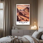A curated art gallery wall that includes the framed Wadi Rum print, showcasing a collection of global desert and mountainous landscapes.