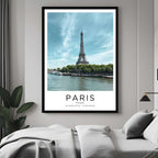 A curated art gallery wall that includes a framed Paris poster, showcasing a creative and personalized collection of prints.