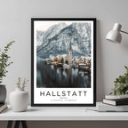 A framed travel poster of Hallstatt, Austria, displayed on a wall in a home office, adding an element of professional and artistic flair.
