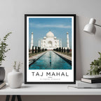 A framed travel poster of the Taj Mahal displayed on a wall in a home office, adding an element of professional and artistic flair.