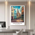 A framed travel poster of Amsterdam displayed on a wall in a home office, adding an element of professional and artistic flair.