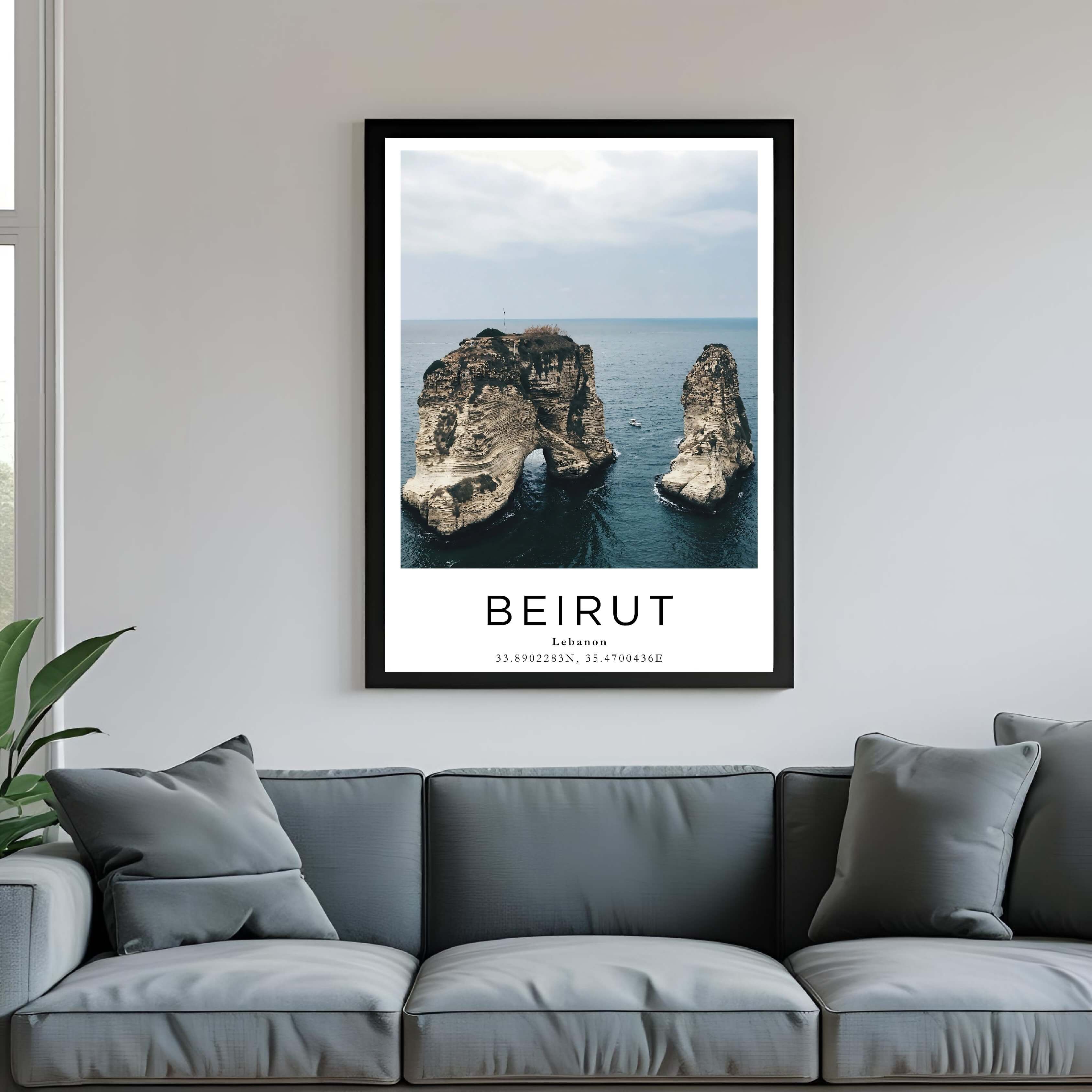  A framed travel print of Beirut’s Raouche Rocks displayed on a wall in a home office, adding an element of professional and artistic flair.