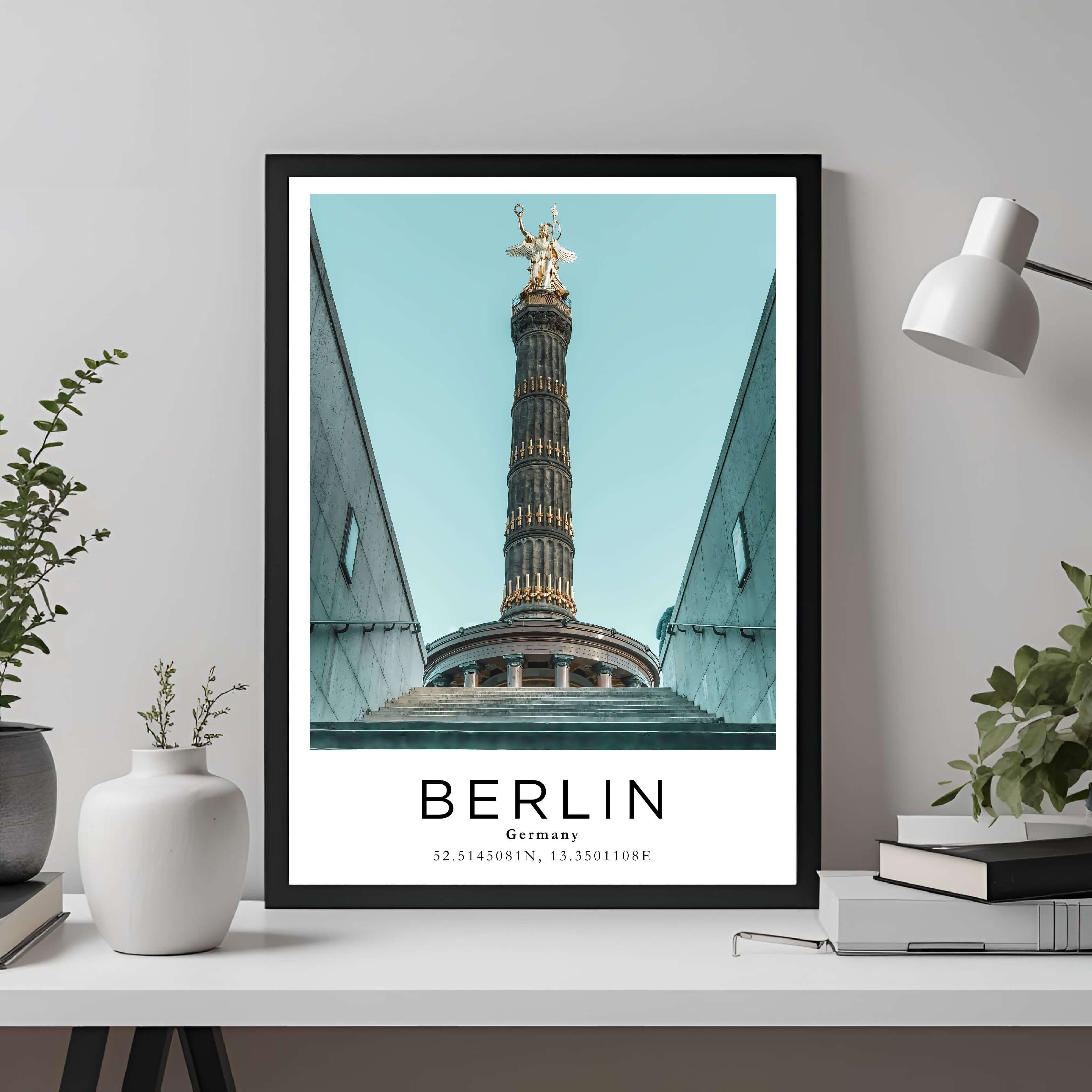A framed travel print of Berlin's famous Victory Column displayed in a home office, adding an element of professional and artistic flair.