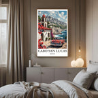 A framed travel poster of Cabo San Lucas displayed on a wall in a home office, adding an element of creative and laid-back flair.
