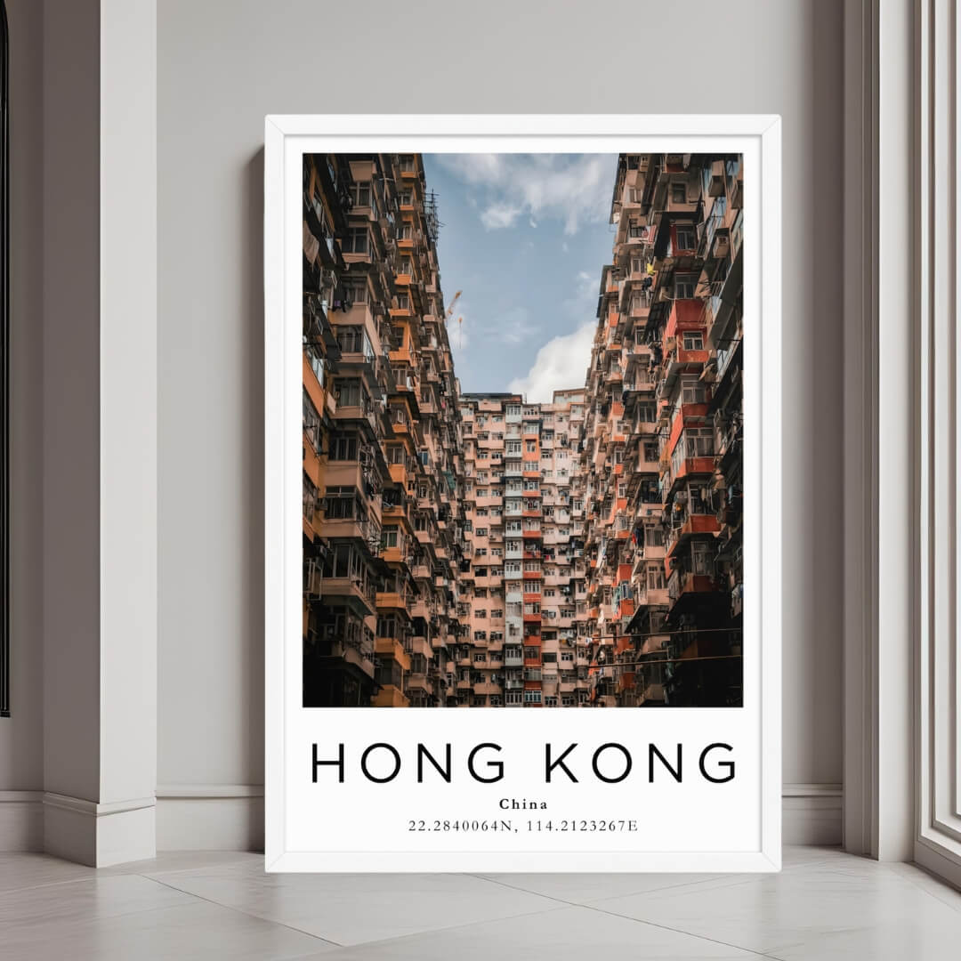 A framed art print of a Hong Kong building with a minimalist white frame, perfect for a clean, modern decor style.