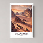 A framed art print of the Wadi Rum scene with a minimalist white frame, emphasizing the contrast between the dark rocks and the bright red-orange sands.