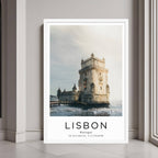 A framed wall art print of the Belém Tower and the Tagus River with a minimalist white frame.
