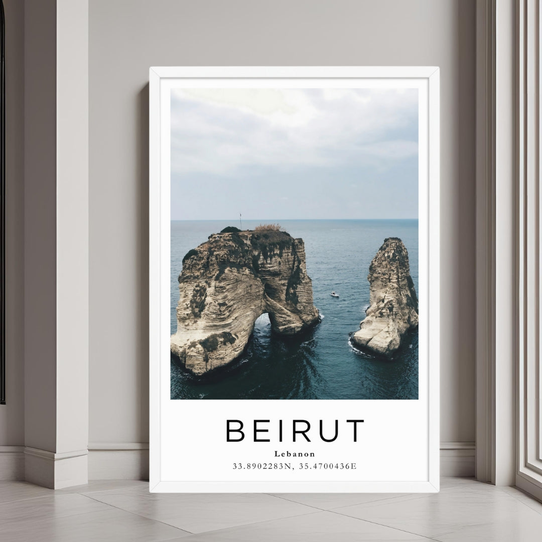 A framed poster of Beirut’s coast hanging above a couch, enhancing the modern and sophisticated look of a living room.