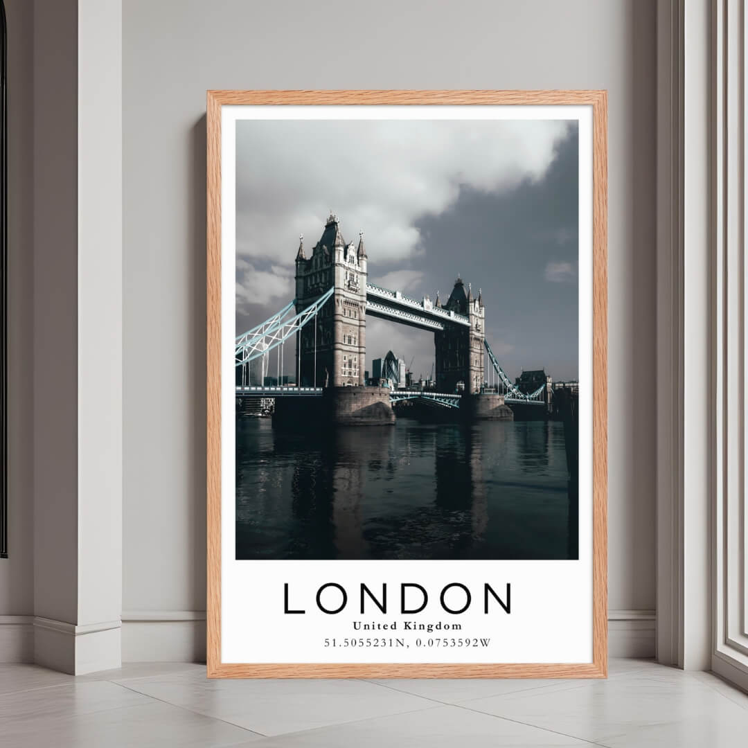 A framed poster of the Tower Bridge in London, UK, with a red oak wood frame, styled in a luxurious modern interior.