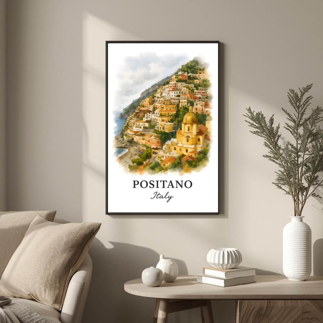 Large framed Positano print hung in a luxury living room. Functions as an elegant centerpiece showcasing Mediterranean architectural art.