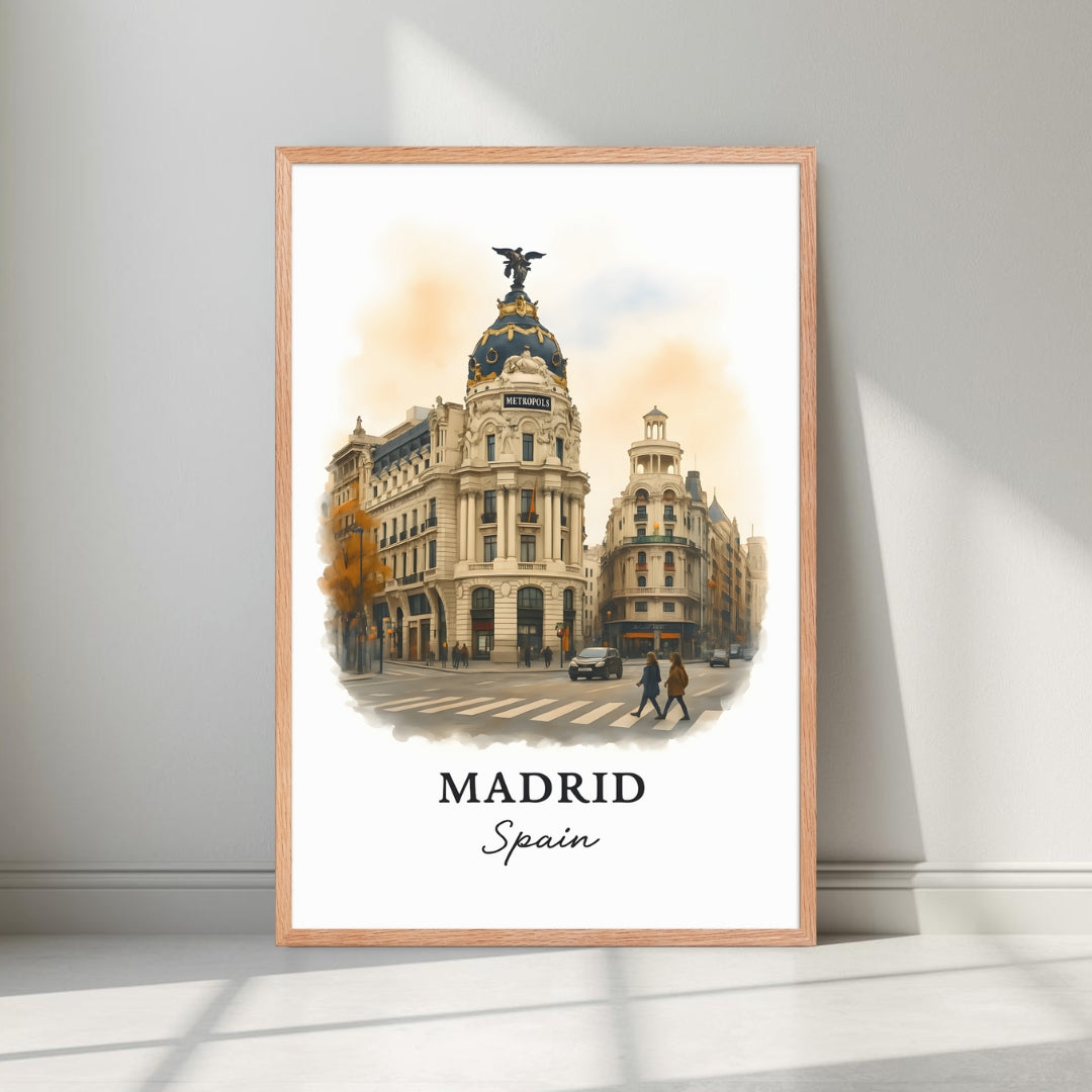 Framed Gran Vía art in a natural Red Oak wood frame. Emphasizes the warm, sun-drenched tones of the Spanish architecture.