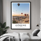  A framed art print of Cappadocia's unique landscape decorating a bedroom wall, creating a serene and luxurious atmosphere.