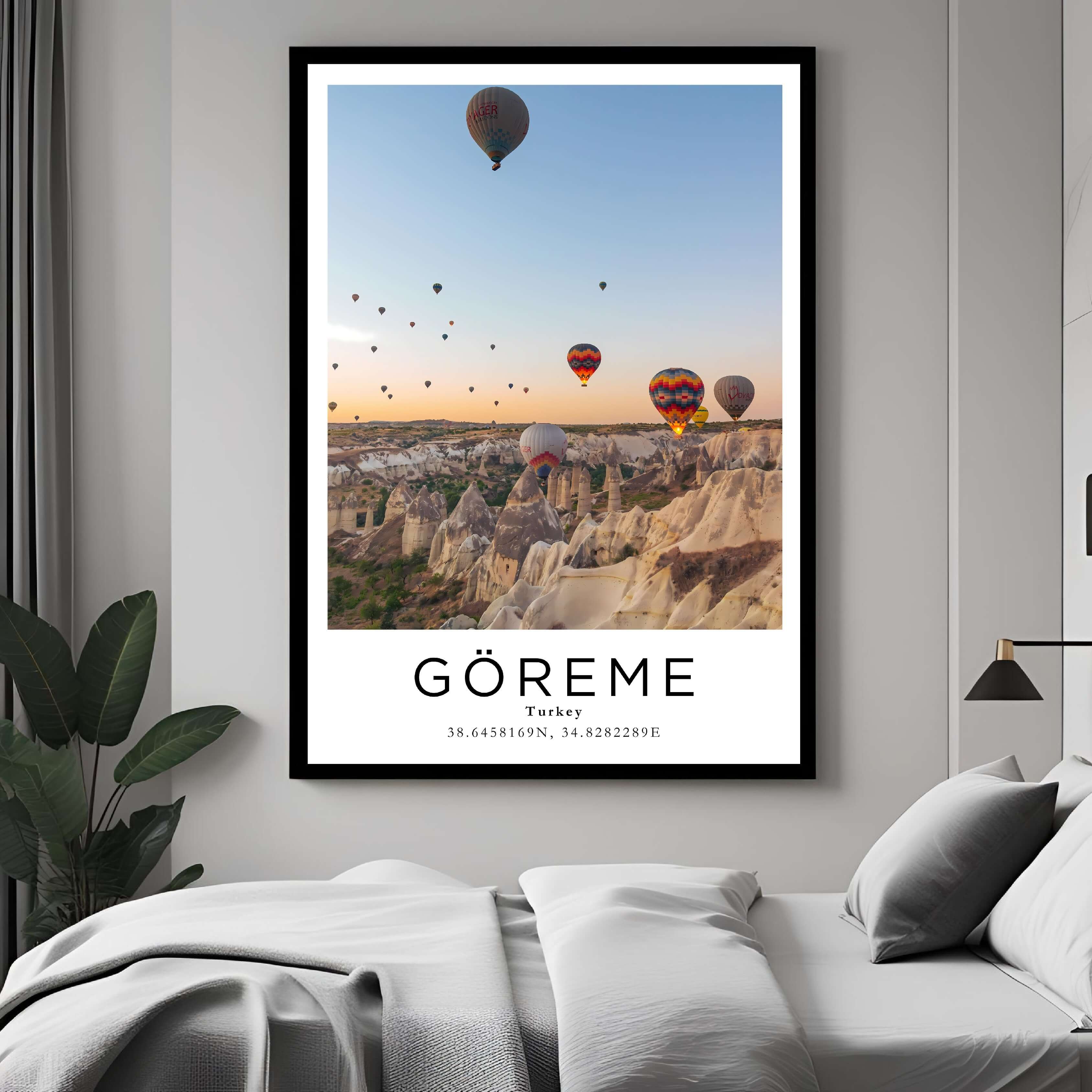  A framed art print of Cappadocia's unique landscape decorating a bedroom wall, creating a serene and luxurious atmosphere.