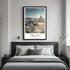  A framed art print of the Tbilisi cityscape decorating a bedroom wall, creating a peaceful and luxurious atmosphere.