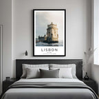A framed art print of the Belém Tower decorating a bedroom wall, creating a serene and luxurious atmosphere.