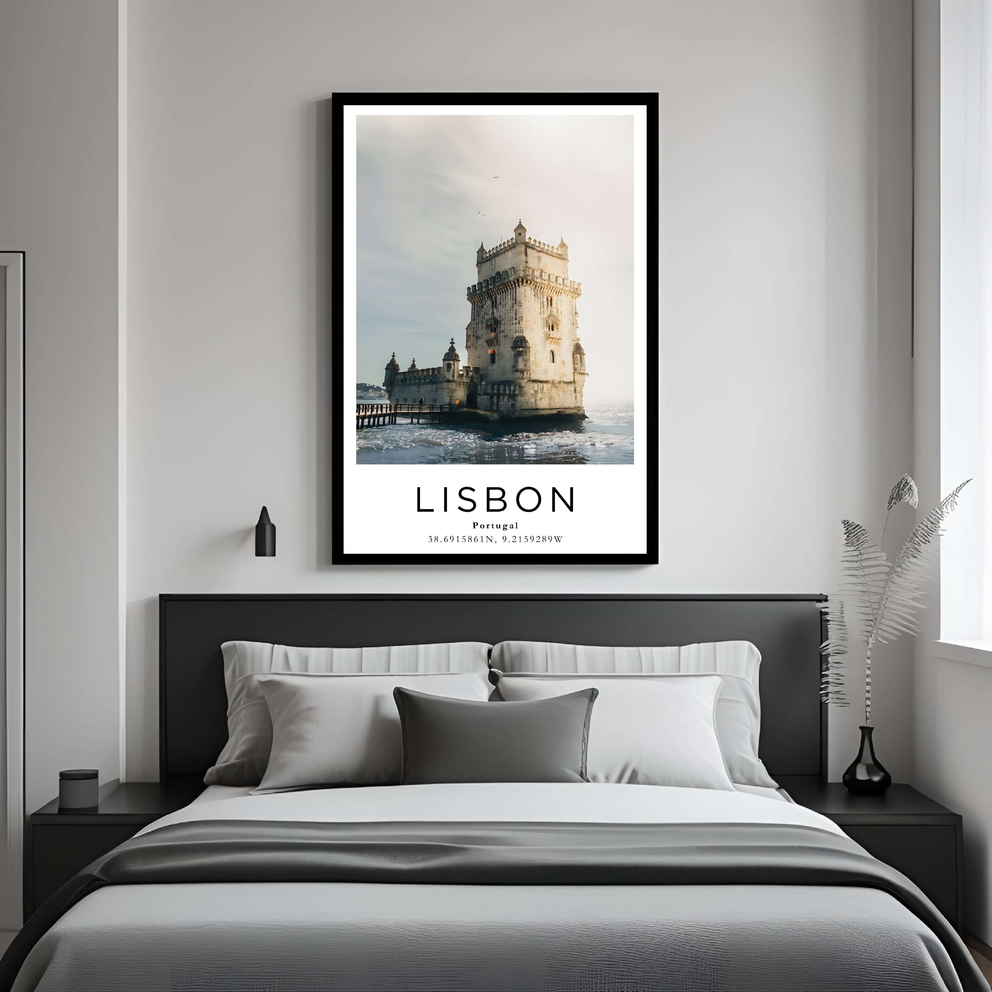 A framed art print of the Belém Tower decorating a bedroom wall, creating a serene and luxurious atmosphere.