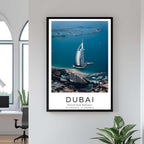 A framed art print of the Burj Al Arab hotel decorating a bedroom wall, creating a serene and luxurious atmosphere.
