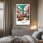 A framed art print of the Paris cityscape decorating a bedroom wall, creating a sophisticated, travel-inspired atmosphere.