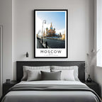 A framed art print of Moscow's iconic landmarks decorating a bedroom wall, creating a serene and luxurious atmosphere.