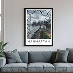A framed poster of the Manhattan skyline hanging in a living room, enhancing the modern and sophisticated look of the space.