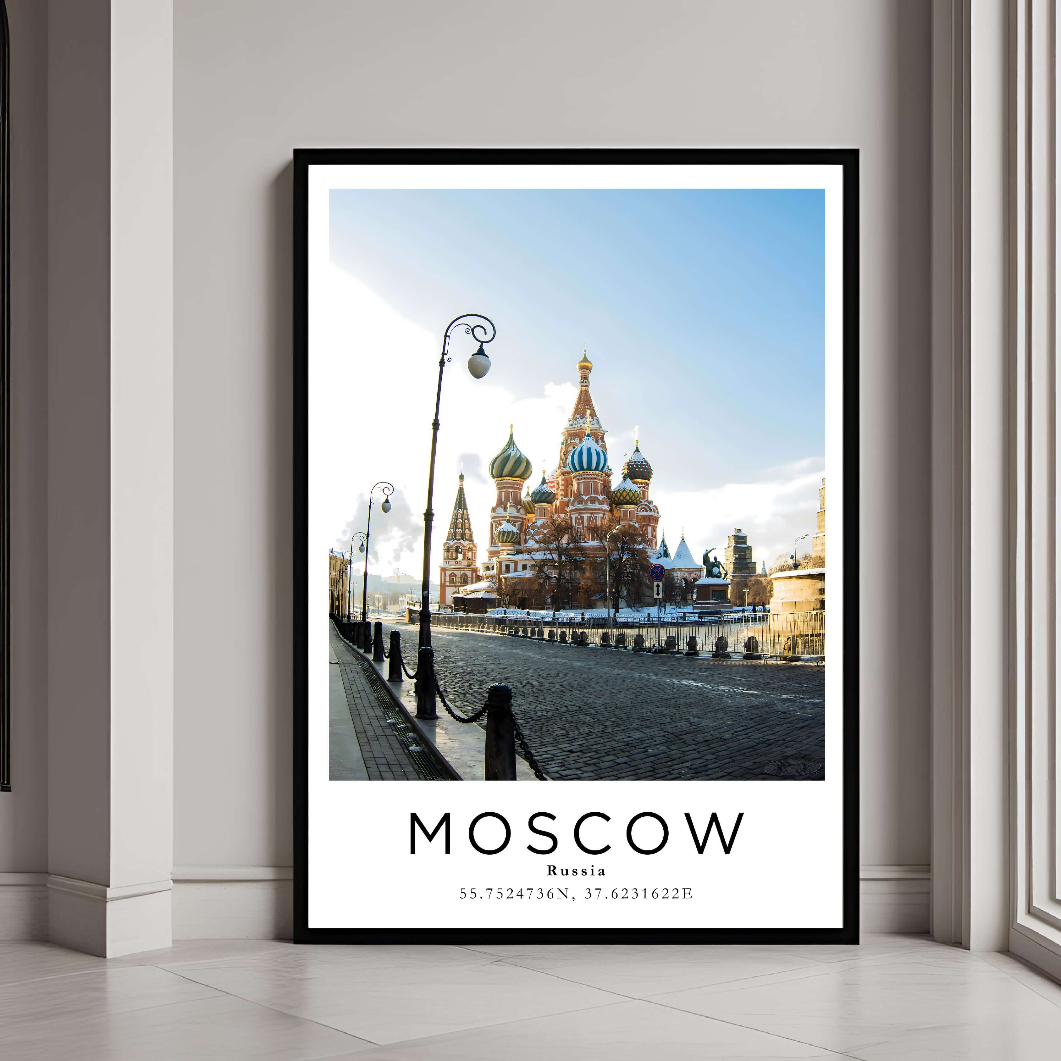 A framed poster of Saint Basil's Cathedral in Moscow, Russia, with a classic black frame, styled in a modern interior.