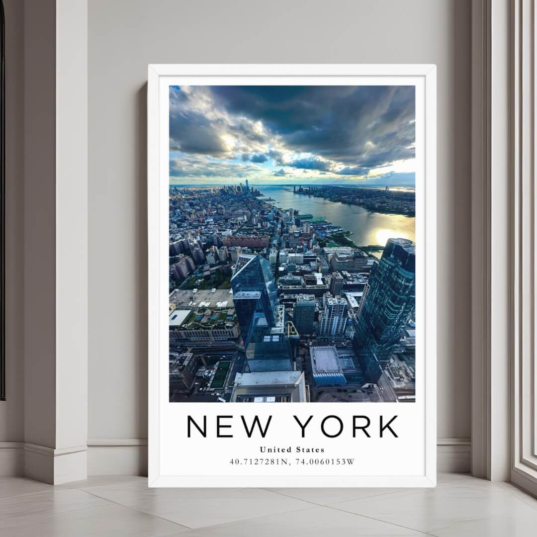  A framed wall art print of the New York City skyline and Hudson River with a minimalist white frame.