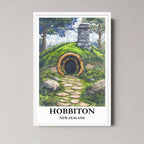 A framed illustration of the Hobbiton scene with a minimalist white frame, highlighting the bright colors of the grass and sky.