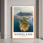 A framed poster of a village in Nordland, Norway, with a red oak wood frame, styled in a luxurious modern interior.