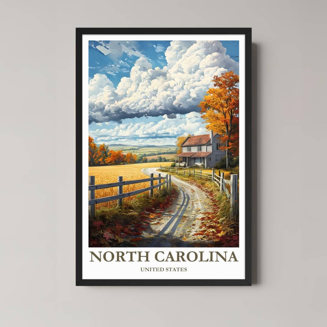A framed, vibrant illustration of a North Carolina farmhouse in autumn, featuring golden fields, a dirt road, and vibrant fall foliage, in a black frame.