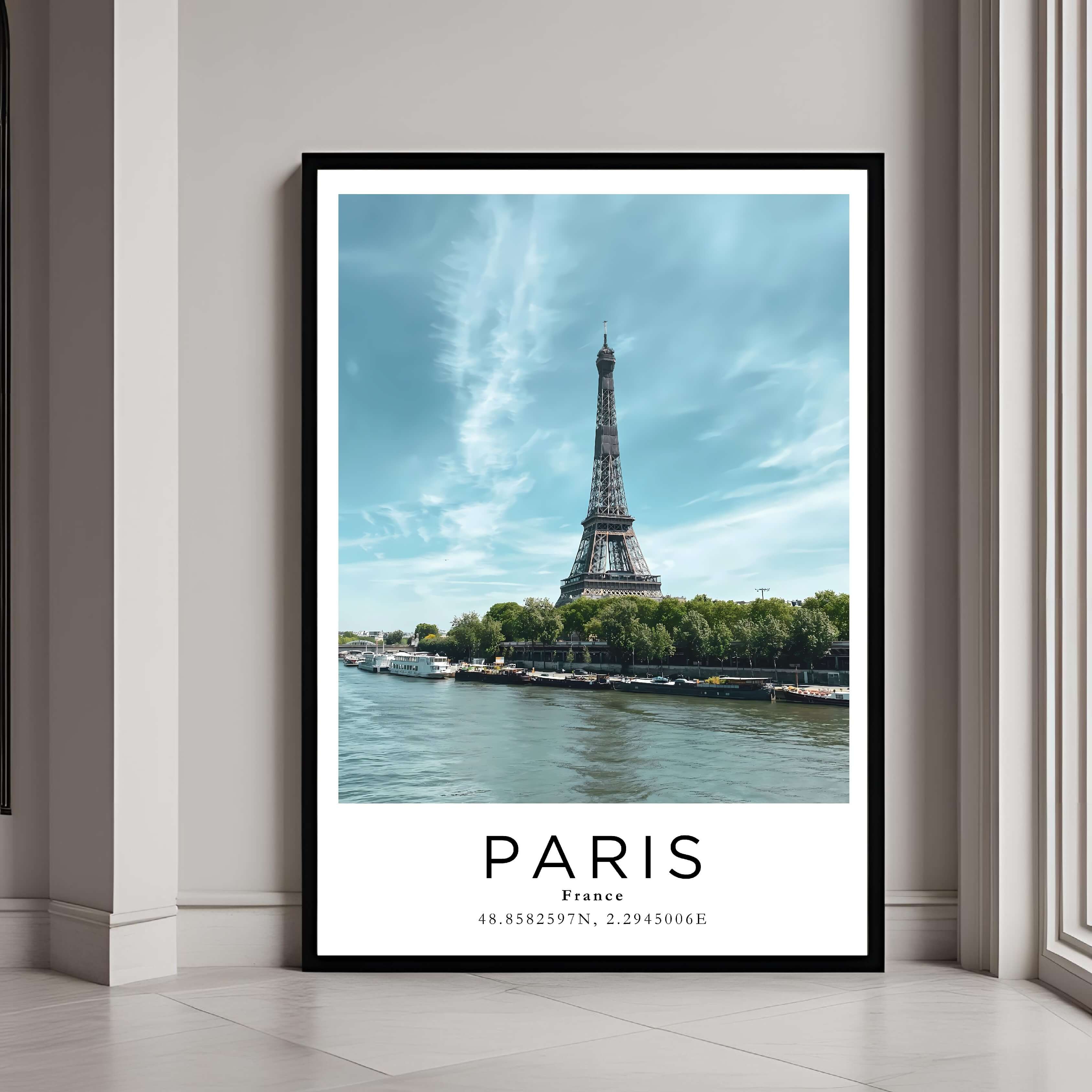 A framed poster of the Eiffel Tower in Paris, France, with a classic black frame, styled in a luxurious modern interior.